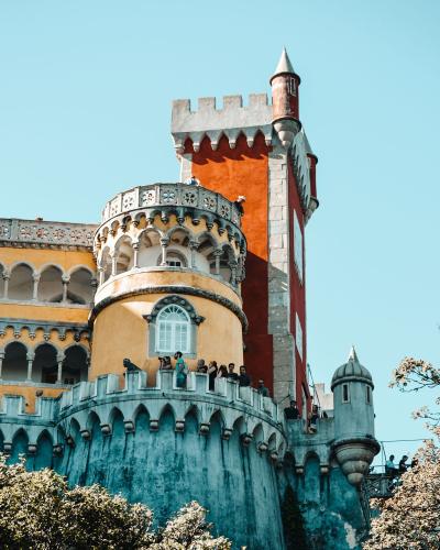 Explore the vibrant architecture of Pena Palace in Sintra, a UNESCO World Heritage Site.