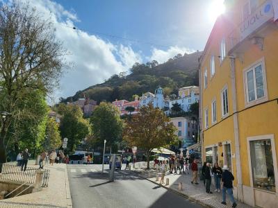 Wide street with guesthouses and hillside views in Sintra, Portugal