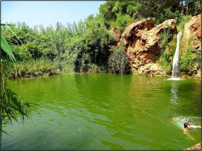 The waterfall and green pool of Pego do Inferno near Tavira