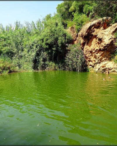 The waterfall and green pool of Pego do Inferno near Tavira