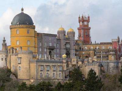 Pena Palace rising above the forested hills of Sintra, Portugal