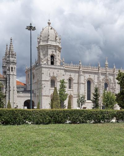 Exterior of Jeronimos Monastery in Belem, Lisbon, with its Manueline tower and dome