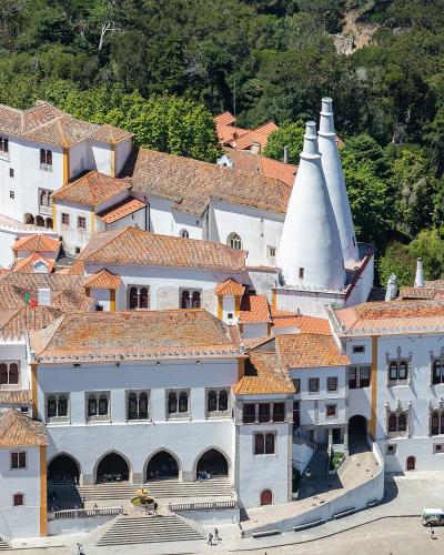 National Palace of Sintra with its twin white conical chimneys, Sintra, Portugal