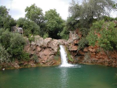 The waterfall and green pool of Pego do Inferno near Tavira
