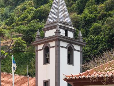 Tiled bell tower of the Sao Vicente parish church on Madeira's north coast