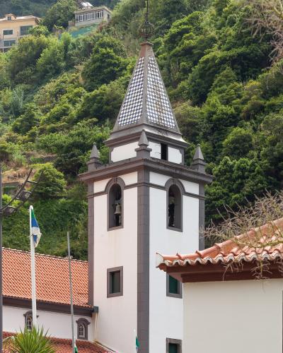 Tiled bell tower of the Sao Vicente parish church on Madeira's north coast