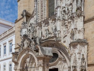 Manueline portal and facade of Santa Cruz Monastery in Coimbra, Portugal