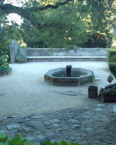 Cloister courtyard and fountain at Convento dos Capuchos in the Sintra hills