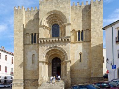 Fortress-like Romanesque facade of the Old Cathedral (Se Velha) in Coimbra, Portugal