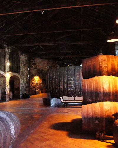 Port wine barrels in the Burmester lodge cellars in Vila Nova de Gaia, Porto