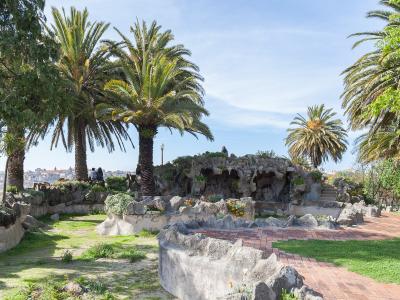 Palm trees and grotto at Jardim do Morro park in Vila Nova de Gaia, overlooking Porto