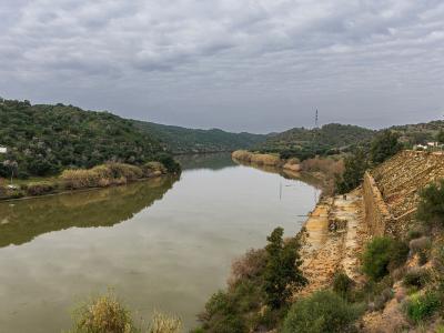 The Guadiana river winding between hills along the Portugal–Spain border