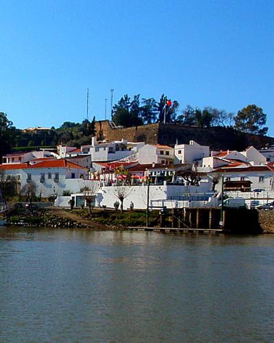 Alcoutim's whitewashed houses on the bank of the Guadiana river
