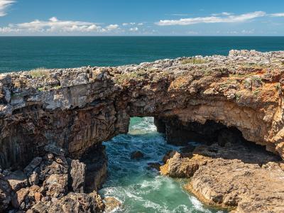 Rock arch and chasm of Boca do Inferno on the Cascais coast