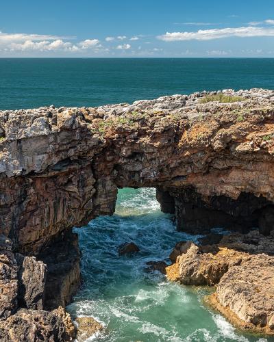 Rock arch and chasm of Boca do Inferno on the Cascais coast