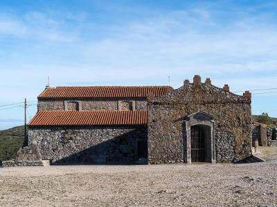 The stone chapel of Nossa Senhora das Neves atop Serra de Montejunto