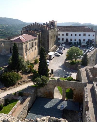 Palmela Castle with its keep and the pousada in the former convent, above wooded hills