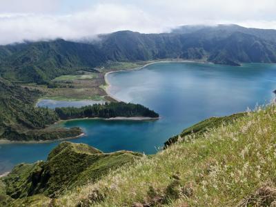 Lagoa do Fogo crater lake with its sandy spit, seen from the caldera rim on São Miguel